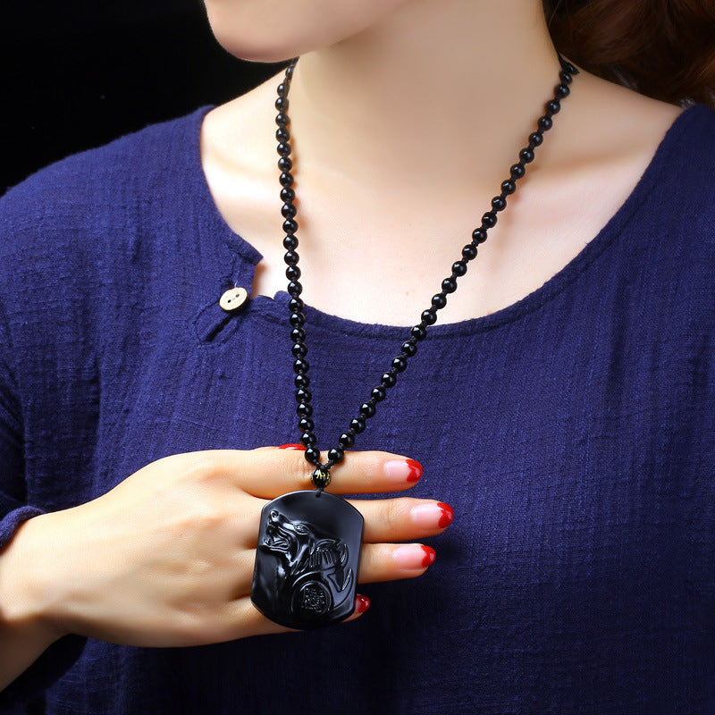 Collier protection obsidienne - Détail pierre volcanique naturelle polie